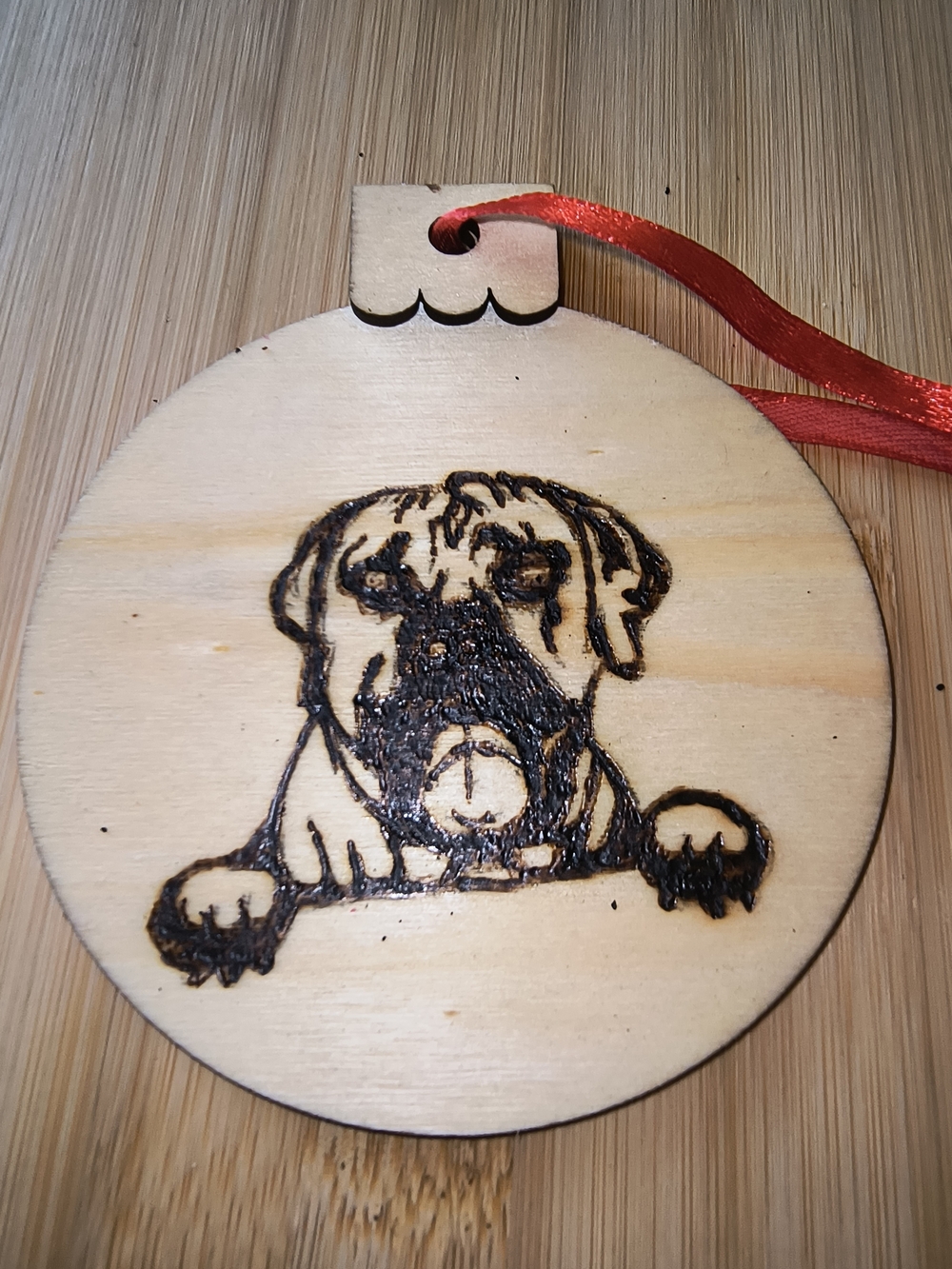 Hand Crafted Wooden Dog Ornament with Red Ribbon
